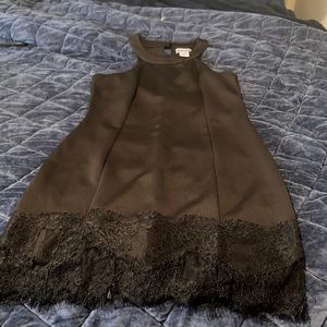 Super cute dress with lace trim on the bottom.